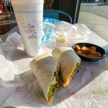 Tropical Smoothie Cafe - Caribbean Jerk wrap, Chai Banana  Boost Smoothie , sweet poatatoes for the side. - Juice Bars & Smoothies Near Me - Oak Lawn, Illinois