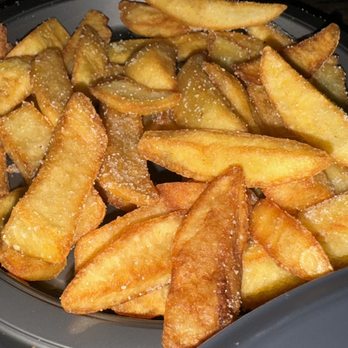 Three Broomsticks - Great French fries! - British Near Me - Orlando, Florida Three Broomsticks - Great French fries! - British Near Me - Orlando, Florida