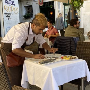Taverna Da Baffo - Masterful preparation of salt crusted Branzino - Italian Near Me - Venezia, VE Taverna Da Baffo - Masterful preparation of salt crusted Branzino - Italian Near Me - Venezia, VE
