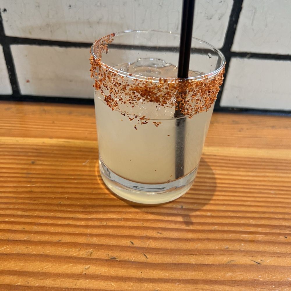 Classic marg with tajin rim. Classic marg with tajin rim.