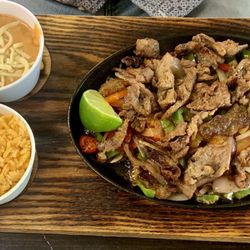 Del Pacifico Mexican & Seafood - Fajitas de Asada comes with rice, beans, homemade tortillas, & salsa