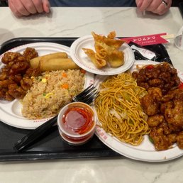 Orange Chicken, Noodles, Wontons, Spring-rolls, and Beijing beef Orange Chicken, Noodles, Wontons, Spring-rolls, and Beijing beef