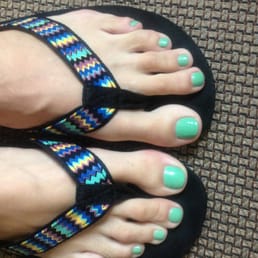 Mint green toes after a great spa pedi ($37)
