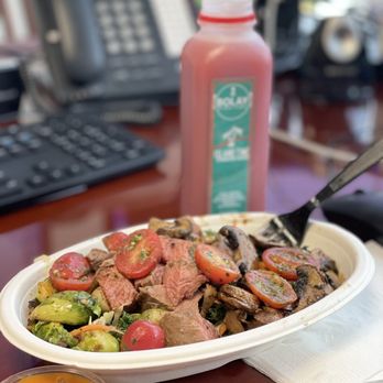 Bolay - Au Jus Steak, kale, mushrooms, Brussels, and chimichurri tomatoes! Side island time juice. - New American Near Me - West Palm Beach, Florida
