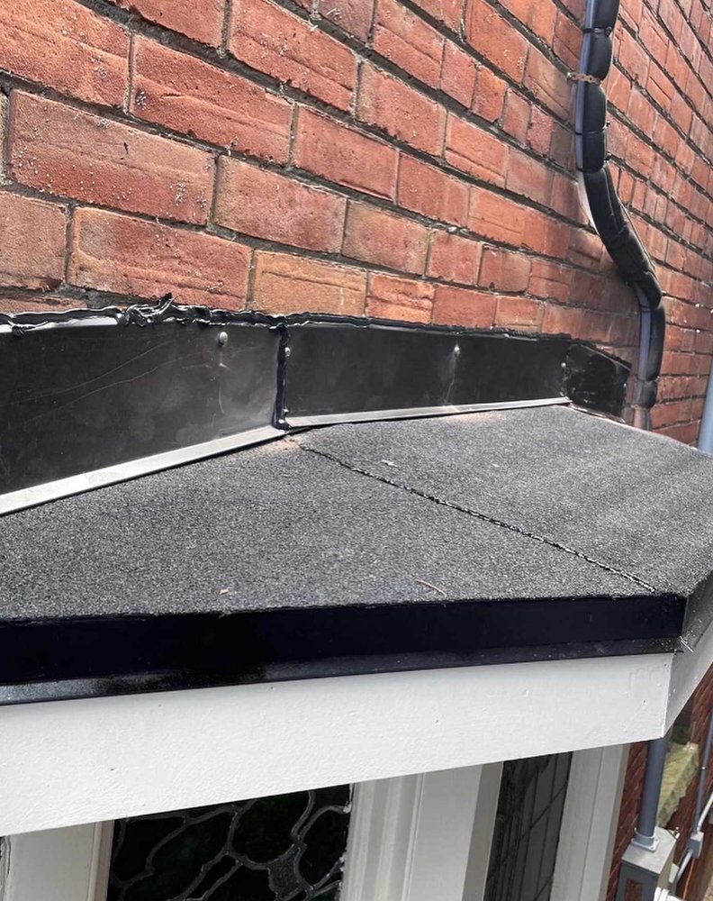 Slide of Dove Springs Roofing