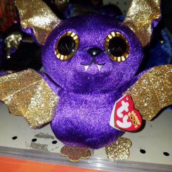 Walgreens - a purple and gold bat with big eyes - Drugstores Near Me - Albuquerque, New Mexico