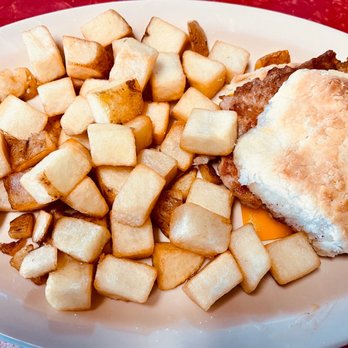 Southern Lady Restaurant - Tenderloin and Hoop Cheese Biscuit with Fried Potatoes - American Near Me - Bowdon, Georgia Southern Lady Restaurant - Tenderloin and Hoop Cheese Biscuit with Fried Potatoes - American Near Me - Bowdon, Georgia