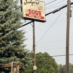 Junkyard Extreme Burgers & Brats - One of the signs outside of the restaurant harkening back to when this place had a drive thru option.