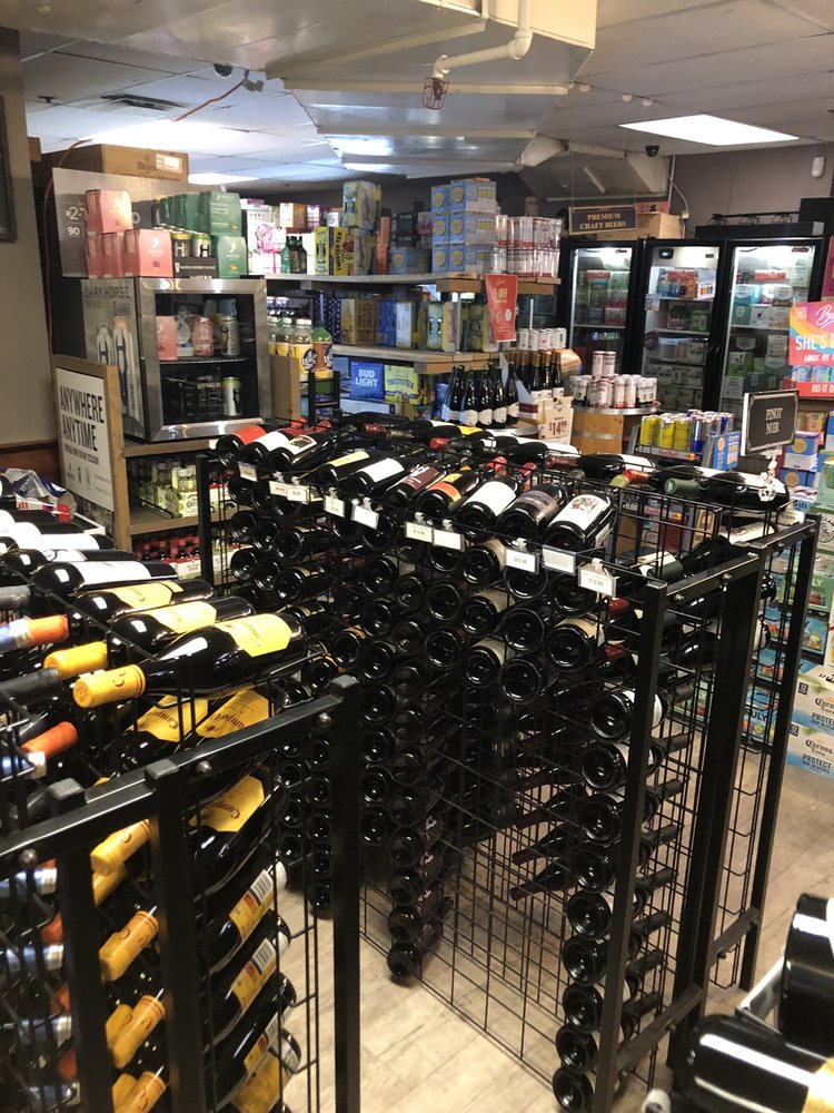 METROPOLITAN WINES & SPIRITS. BEER, CIGARS AND CIGARETTES. Updated