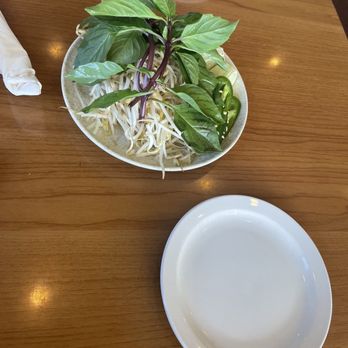 Taste of Pho - two plates of food on a table - Vietnamese Near Me - Spring, Texas Taste of Pho - two plates of food on a table - Vietnamese Near Me - Spring, Texas