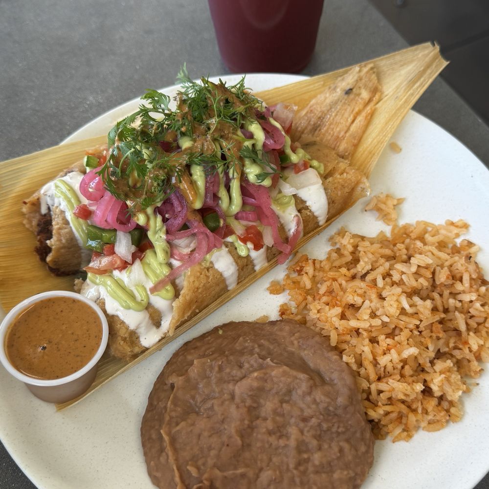 Tamarindo/jamaica agua fresca 2 Tamal Plate with Beans & Rice Tamarindo/jamaica agua fresca 2 Tamal Plate with Beans & Rice
