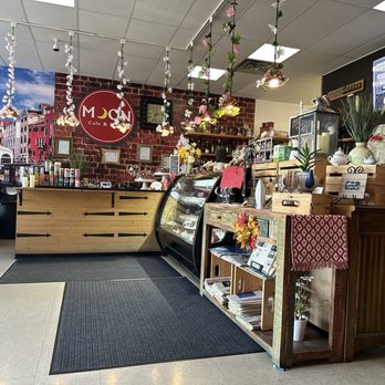 Moon Cafe and Pizza - Front counter and till, with tasty Italian desserts in the glass display case - Pizza Near Me - Edmonton, Alberta