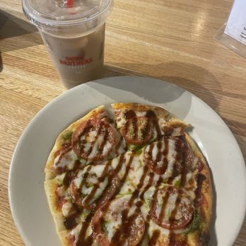 Dunn Brothers Coffee - Margherita Naan Pizza, and a Medium Iced Latte w/ Oat Milk - Coffee & Tea Near Me - Lakeville, Minnesota Dunn Brothers Coffee - Margherita Naan Pizza, and a Medium Iced Latte w/ Oat Milk - Coffee & Tea Near Me - Lakeville, Minnesota