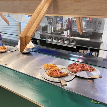 Mountain Pizza & Taproom - pizzas on the counter - Pizza Near Me - South Fork, Colorado