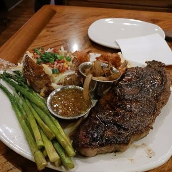 Outback Steakhouse - Steak, Baked Potato Loaded, asparagus, 6 Coconut Shrimp. - Steakhouses Near Me - Southaven, Mississippi Outback Steakhouse - Steak, Baked Potato Loaded, asparagus, 6 Coconut Shrimp. - Steakhouses Near Me - Southaven, Mississippi