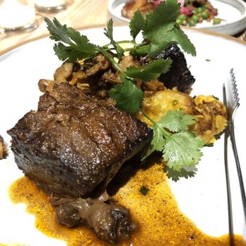 Lechon - Braised short rib with aji panca - Tapas Bars Near Me - Portland, Oregon Lechon - Braised short rib with aji panca - Tapas Bars Near Me - Portland, Oregon