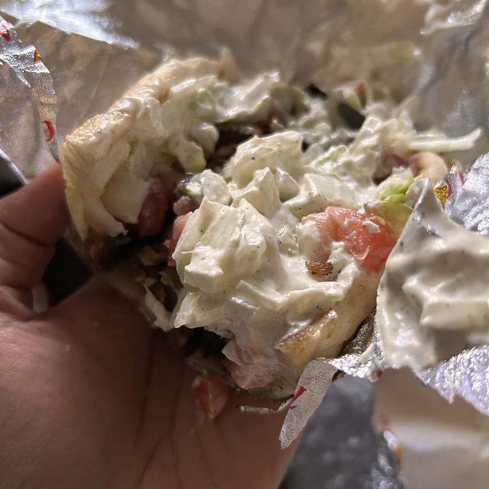 The Halal Guys - I had my Sandwhich cut in half and this is all the onions on top - Middle Eastern Near Me - Charlotte, North Carolina The Halal Guys - I had my Sandwhich cut in half and this is all the onions on top - Middle Eastern Near Me - Charlotte, North Carolina