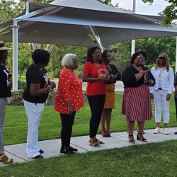International Peace Gardens - Delta's present Sandra Hollins with an award.