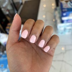 M Vincé Nail Spa - Took this while waiting in line to pay. The polish is uneven and my cuticle area looks messy.