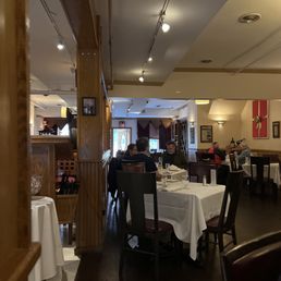 the dining room with tables and chairs