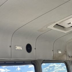 M & M Limousine and Bus Services - Stains on ceiling and dripping liquid onto us
