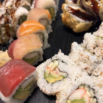 Budi's Sushi Two Go - Rainbow roll, California roll, shrimp tempura roll, and a tempura inside out roll- super! - Asian Fusion Near Me - Dunwoody, Georgia