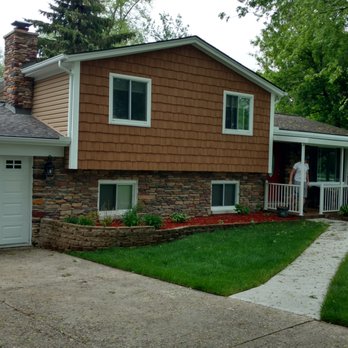 Direct Exteriors - Hazelnut Siding Mountain Cedar Shake White Trim - Windows Installation Near Me - Waterford Township, Michigan Direct Exteriors - Hazelnut Siding Mountain Cedar Shake White Trim - Windows Installation Near Me - Waterford Township, Michigan