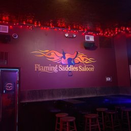 a bar with red lights a bar with red lights
