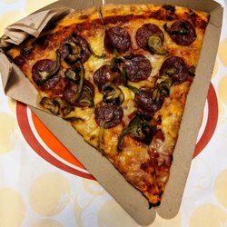 Pizza Pizza - My pepperoni supreme slice for takeout. With a canned pop, all of it is $6.19 with tax.