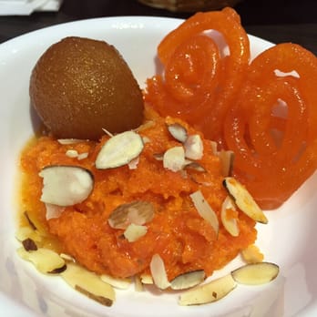 India's Taste - Orange paste with honey timbit and neon orange pretzel. - Indian Near Me - Markham, Ontario