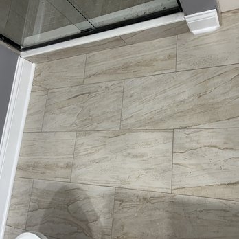 Global Home Improvement - Closeup of bathroom tiles - General Contractors Near Me