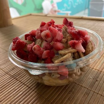 Cerealism - Cereal bowl with scooped vanilla ice cream and strawberries. - Desserts Near Me - Old Sacramento, California