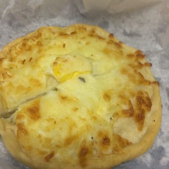 Sultan's Market - Baked Egg & Cheese Pie! It's a cooked egg with mozzarella cheese and a flaky crust!! - Middle Eastern Near Me - Chicago, Illinois Sultan's Market - Baked Egg & Cheese Pie! It's a cooked egg with mozzarella cheese and a flaky crust!! - Middle Eastern Near Me - Chicago, Illinois