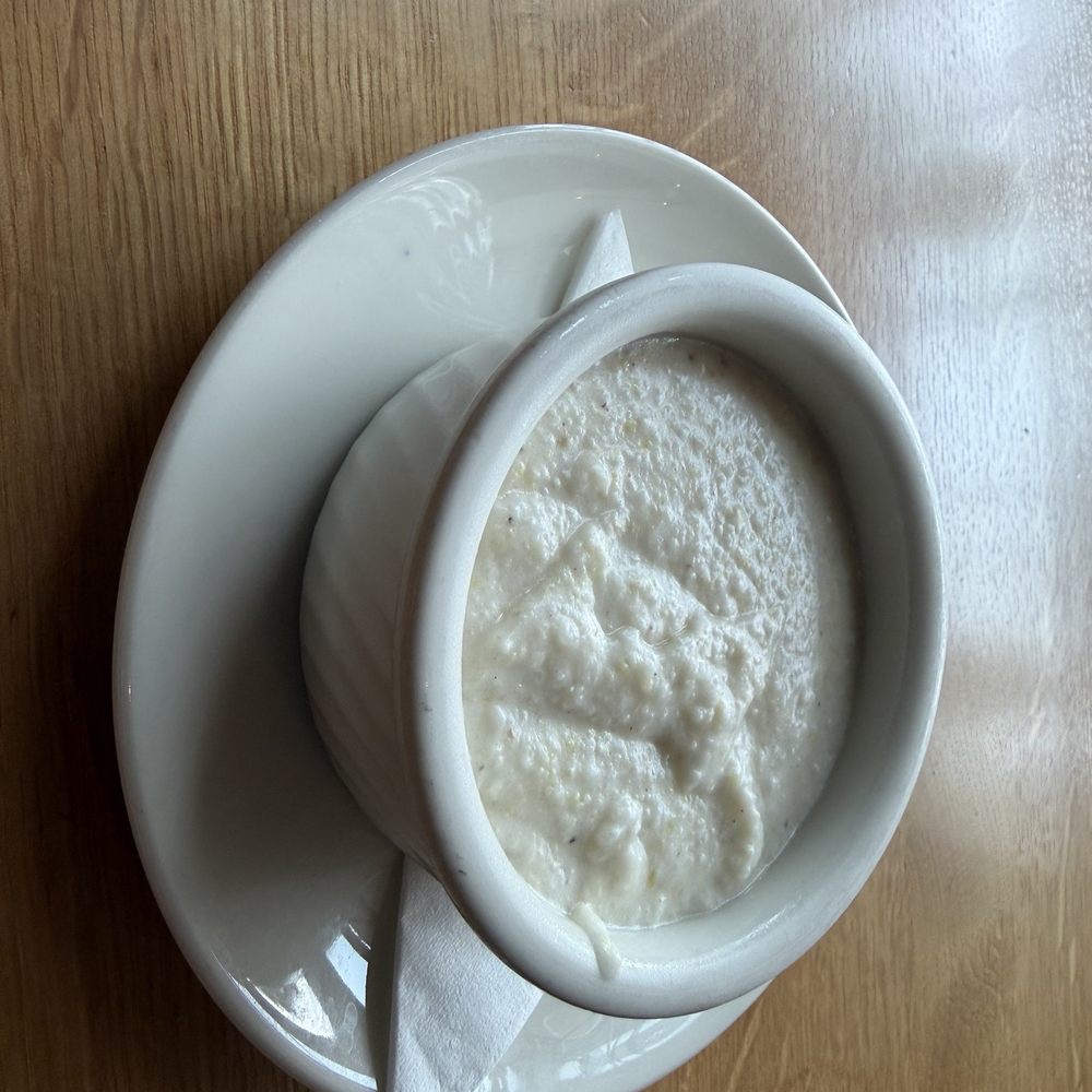 Tupelo Honey Southern Kitchen & Bar - Heirloom Grits with Goat Cheese*** - New American Near Me - Frisco, Texas Tupelo Honey Southern Kitchen & Bar - Heirloom Grits with Goat Cheese*** - New American Near Me - Frisco, Texas
