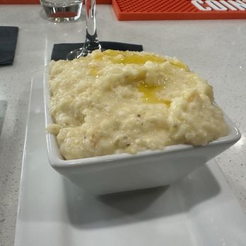 Cafe Social House - Delicious grits! You can order it with or without cheese - Breakfast & Brunch Near Me - Mableton, Georgia