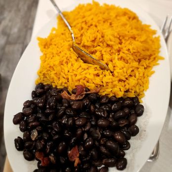 Manolo's Churrasqueira - a plate of rice and beans - Seafood Near Me - Bellmore, New York
