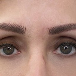 Powdered stroke eyebrows and permanent eyeliner