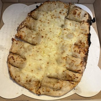 Pizzeria Nomad - Cheesy Bread - Pizza Near Me - Amarillo, Texas Pizzeria Nomad - Cheesy Bread - Pizza Near Me - Amarillo, Texas