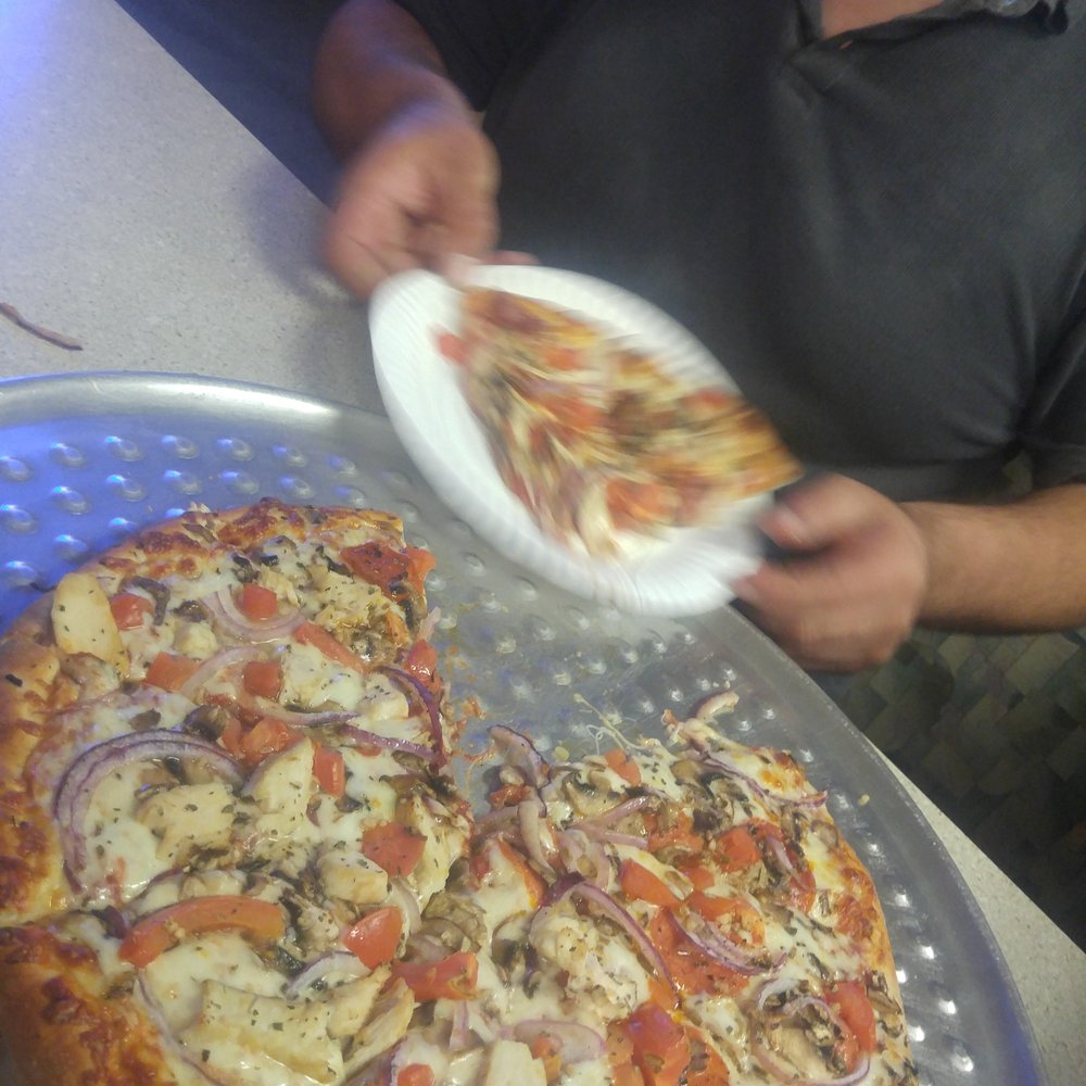 Baldwin Park Pizza - Cousin getting down to this bomb pizza! - Pizza Near Me - Baldwin Park, California