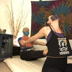 Thai Dai Massage - Another heart opener in a seated position.