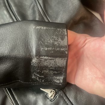 Wilson Leather - This is a brand new jacket and I took the sticker off that they put on and the leather peeled off - Leather Goods Near Me - Lake Arrowhead, California