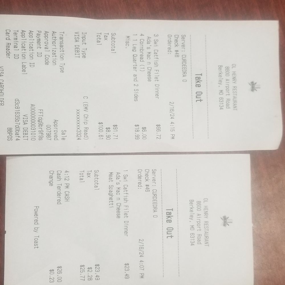 OL' Henry Restaurant - wo menus on a table - Soul Food Near Me - St. Louis, Missouri