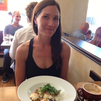 Tilia - Ellie with Chilequiles with Poached Eggs - New American Near Me - Minneapolis, Minnesota Tilia - Ellie with Chilequiles with Poached Eggs - New American Near Me - Minneapolis, Minnesota