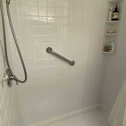 Removed old combo tub/shower and installed beautiful full shower stall.