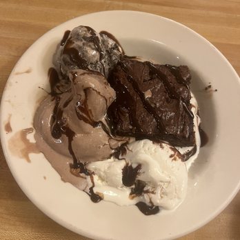 Maddox Ranch House - Cookies and cream, chocolate, and vanilla ice cream with a brownie and chocolate drizzle. - Steakhouses Near Me - Perry, Utah