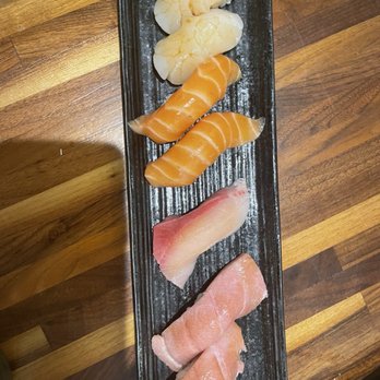 Yuyake Dan Dan Japanese Tapas - A plate of hotate, salmon, hamachi, and otoro nigiri - Izakaya Near Me - Pleasanton, California