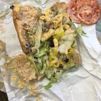 Subway - This is the sandwich they gave me and their idea of "light on the chipotle sauce". Won't ever go here again. - Sandwiches Near Me - High Point, North Carolina