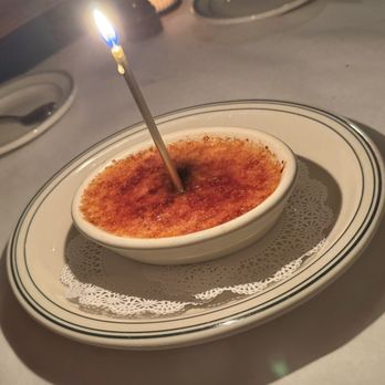 Wright’s Tavern - Creme Brûlée with Bday candle - OMG SO YUMMY! - Steakhouses Near Me - Clayton, Missouri Wright’s Tavern - Creme Brûlée with Bday candle - OMG SO YUMMY! - Steakhouses Near Me - Clayton, Missouri
