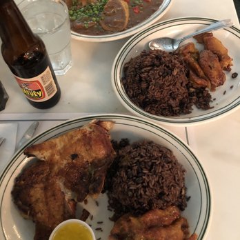 Versailles - Beef tongue in the back. Chicken in the front with plantains and rice - Cuban Near Me - Miami, Florida Versailles - Beef tongue in the back. Chicken in the front with plantains and rice - Cuban Near Me - Miami, Florida