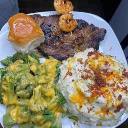Ribeye, grilled shrimp, cheezy broccoli and loaded mashed potato special.